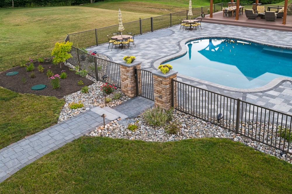 Pool patio with safety fence
