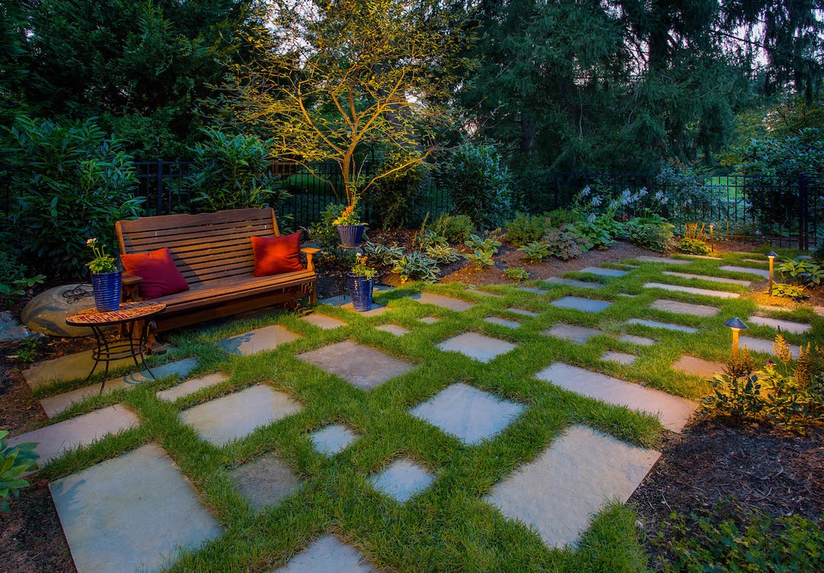 Backyard with stepping stones and bench