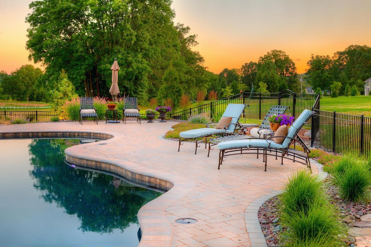 Pool patio with trees and shrubs in Lancaster, PA