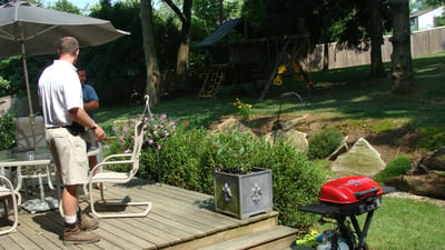 Downingtown PA landscaping project with patio, outdoor kitchen and outdoor fireplace.