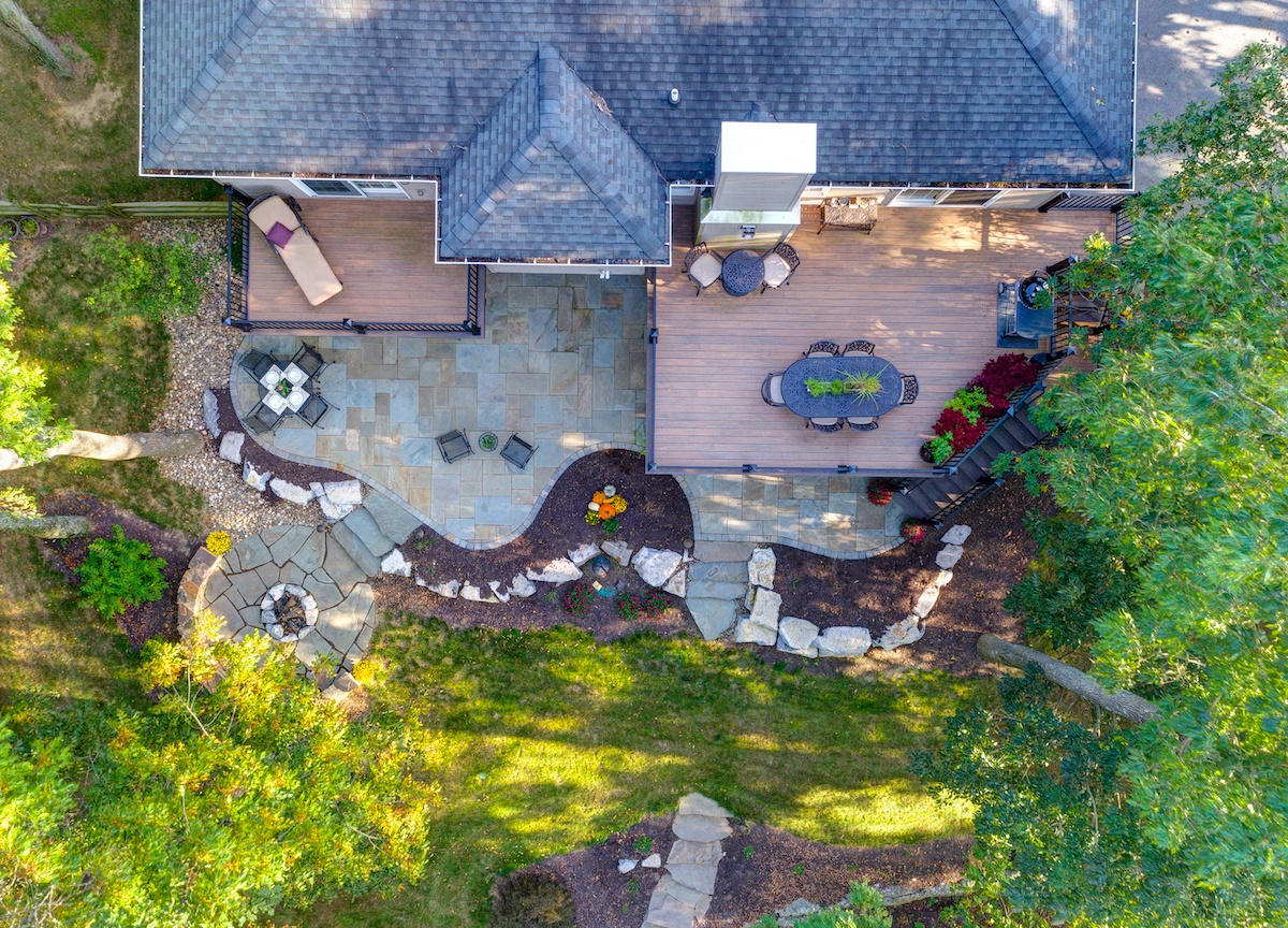 flagstone-patio-aerial-fire-pit-deck