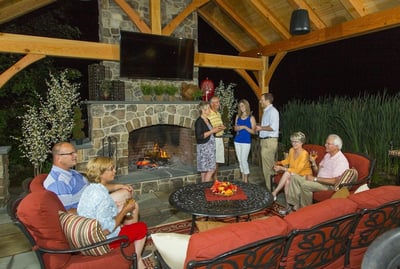 An outdoor fireplace vs. a fire pit? Get tips to answer this landscape design question.