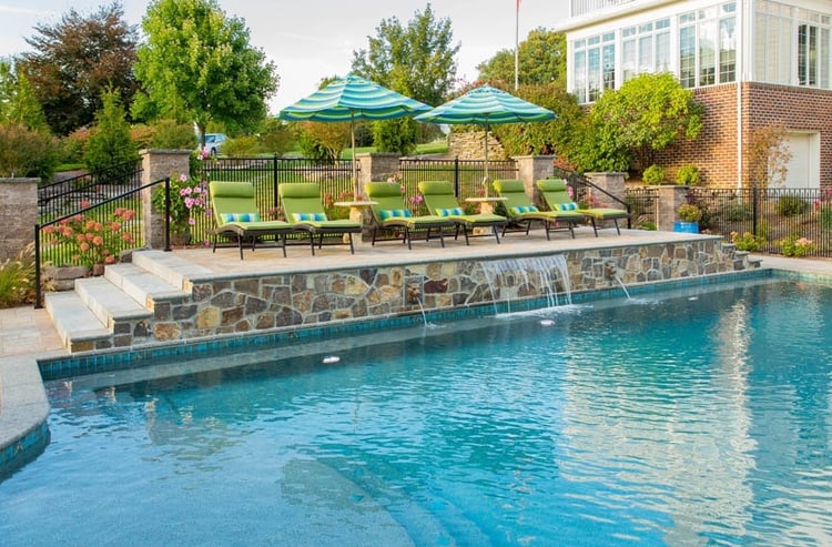 York, PA landscaping and pool design including a kitchen, plantings, lighting, and more.